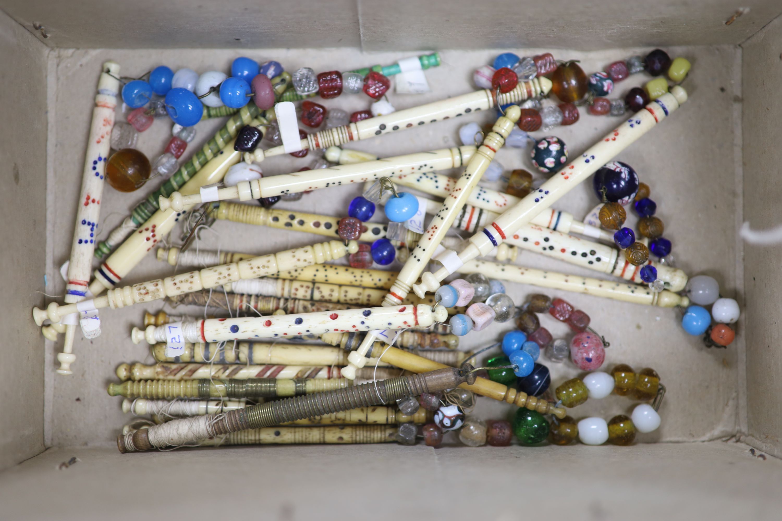 A small collection of Victorian lace-makers bone bobbins, some named